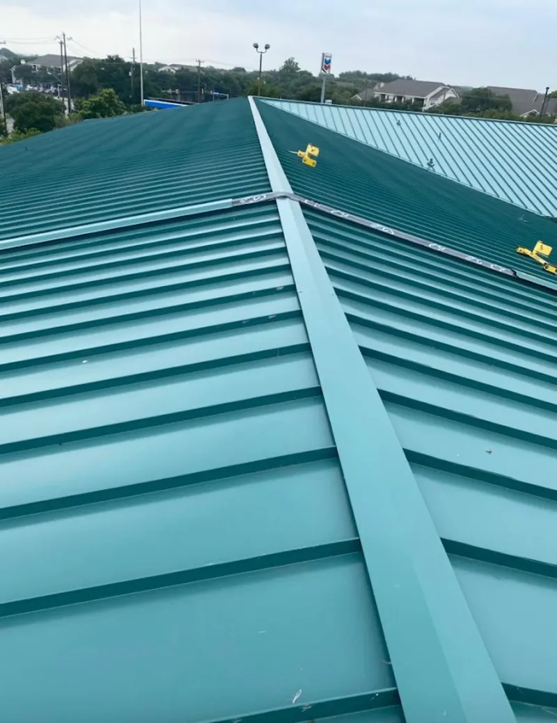 Green commercial metal roof ridge and valley for Metal Roof Repair in Garden Acres